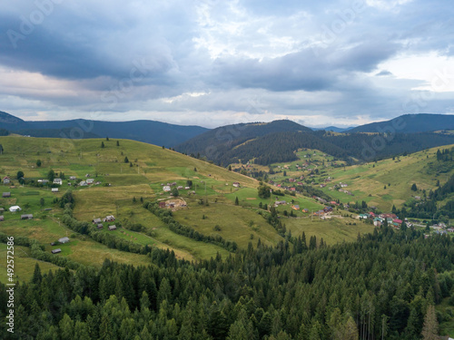 Green Ukrainian Carpathians mountains in summer. Aerial drone view.