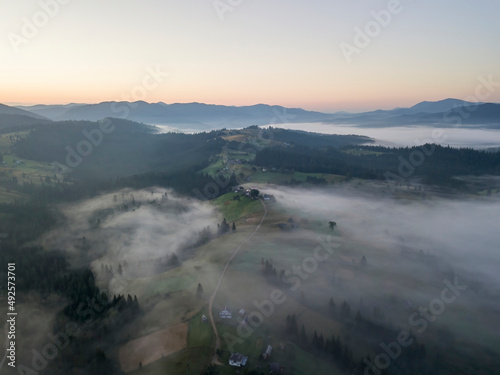 Morning fog in the Ukrainian Carpathians. Aerial drone view.