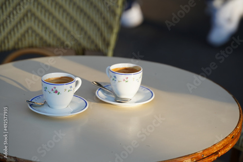 Two cups of espresso coffee on a coffee shop terrace from Paris  France.
