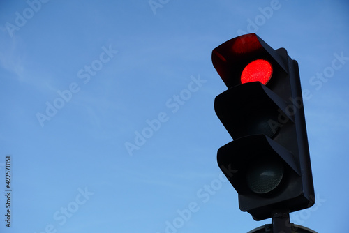 traffic lights. traffic light caught on the red color for cars. stop.