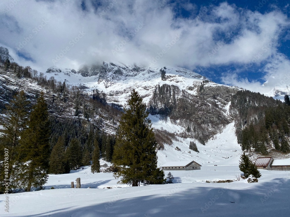 Fototapeta premium Snow-capped alpine peak Stoss (or Stooss, 2112 m) in Alpstein mountain range and in Appenzell Alps massif, Unterwasser - Canton of St. Gallen, Switzerland (Schweiz)