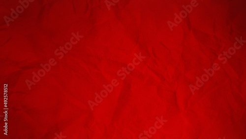 Beautiful panorama texture of red yellow crumpled paper with darkened sides