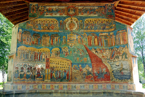 Voronets Monastery, Suceava County, Moldavia, Romania: One of the famous painted churches of Moldavia. Detail of the colorful medieval frescos on the Saint George Church. photo