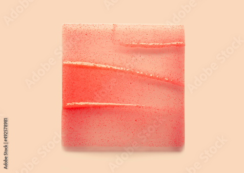 Obraz na płótnie Lipstick balm transparent smudge lip gloss swatch isolated on white background