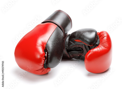 Red boxing gloves isolated on a white background © adragan
