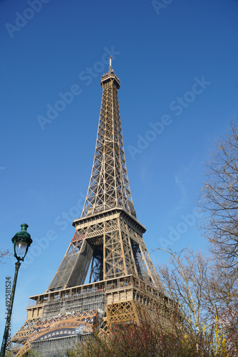 Eiffel Tower from Paris, photographed during a cloudy day from the spring of 2022, landmark in France.