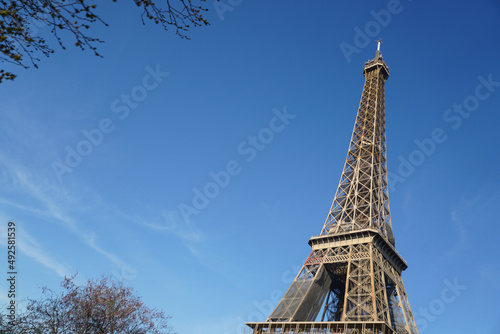 Eiffel Tower from Paris, photographed during a cloudy day from the spring of 2022, landmark in France. © samy