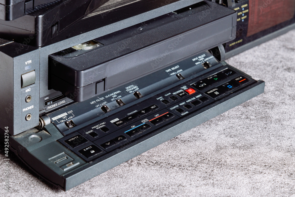 VHS tape in VCR player. VHS tape in VCR player.