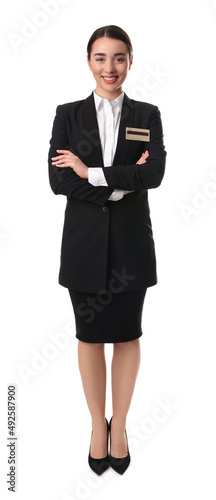 Full length portrait of happy young receptionist in uniform on white background