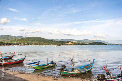 Fototapeta Naklejka Na Ścianę i Meble -  Fishing boats on the shore at low tide . Thailand