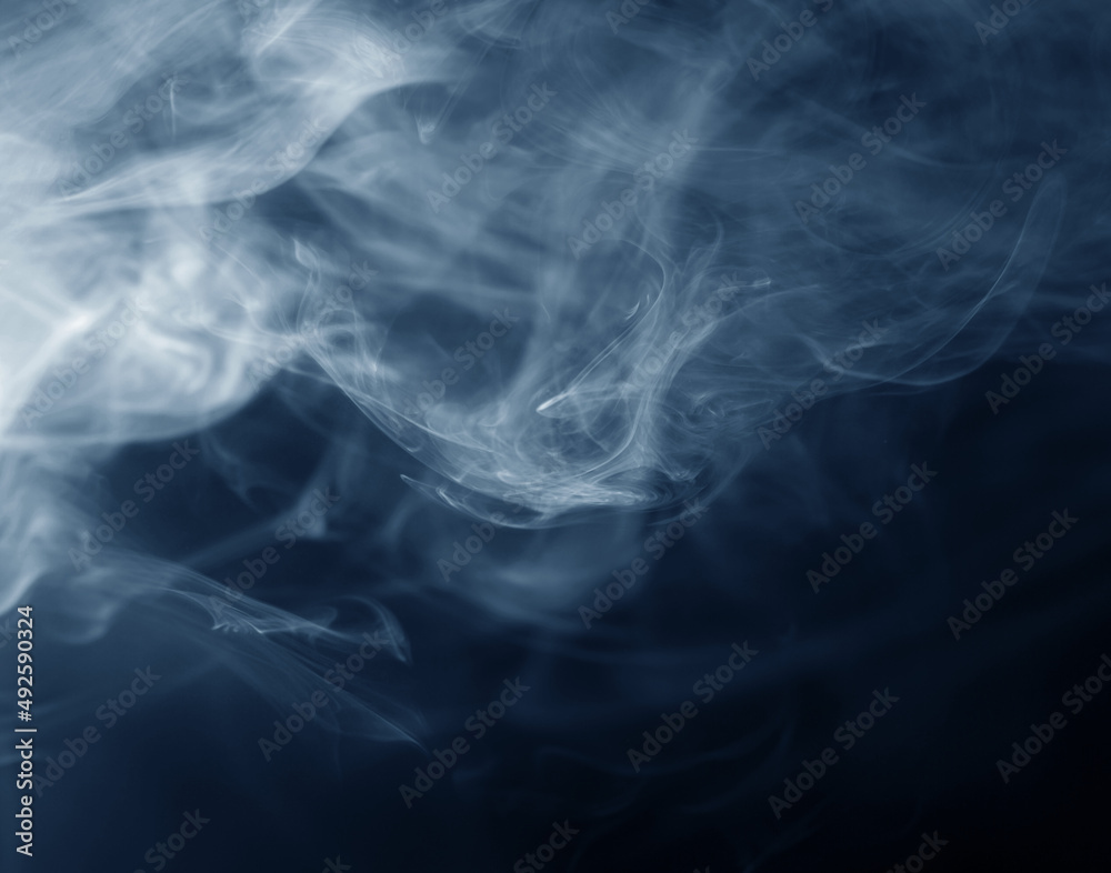 Smoke over black background. Fog or steam texture. Smoke over black background. Fog or steam texture.