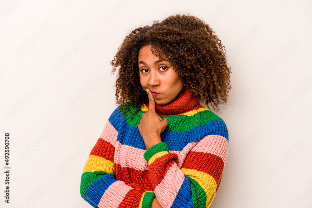 Young African American woman isolated on white background contemplating, planning a strategy, thinking about the way of a business.