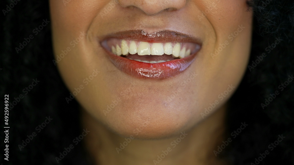 A black woman smiling mouth macro close-up A black woman smiling mouth macro close-up