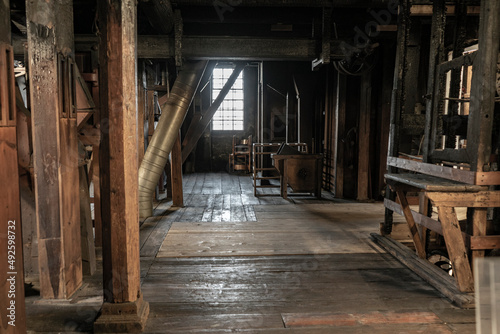 Interior of an old historic factory with machinery © Filippo Carlot