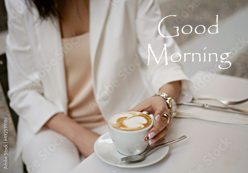 Cup of drink with text "Good Morning" greeting.