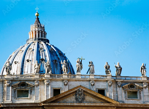 Close-up of the roof with the Apostles statues along the façade of St. Peter's Basilica, Rome, Italy.