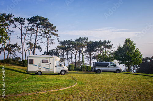 Campervans in the campsite. Vans in the nature.