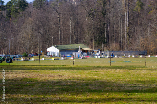 Driving range at City of Zürich with flag and golf balls on a sunny spring day. Photo taken March 1st, 2022, Zurich, Switzerland. photo