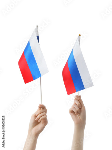 Female hands with Russian flags on white background, closeup