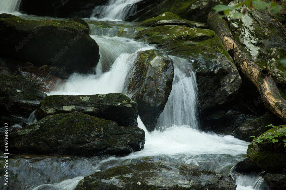 Cascading waterfall with rocks