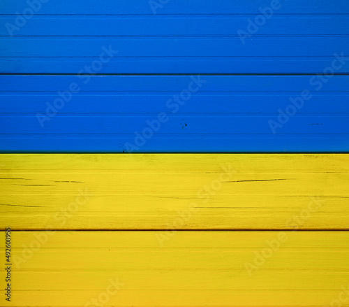 Wooden background in Ukraine flag colors