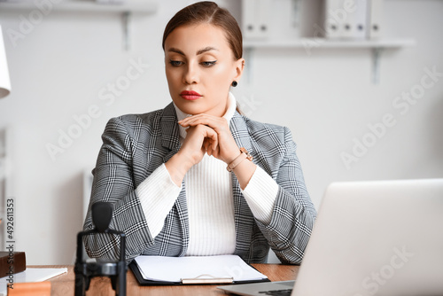 Female notary public workin...