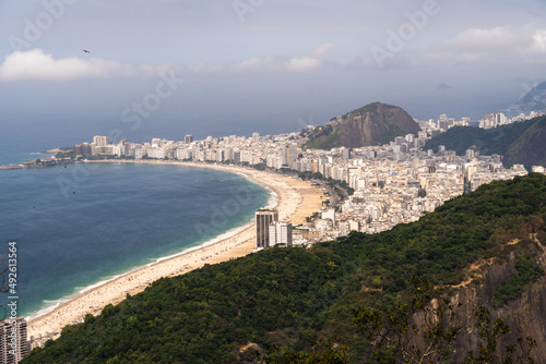 Aerial view of Copacabana beach with its buildings  sea and landscape. Huge hills along the entire length. Immensity of the city of Rio de Janeiro  Brazil in the background