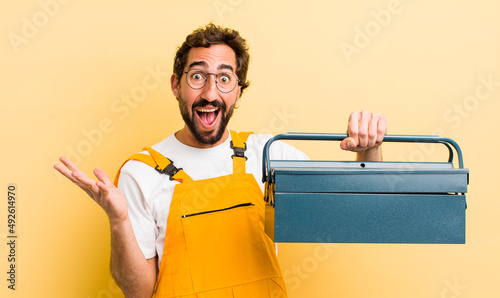 Cuadro en lienzo young crazy handyman with a toolbox
