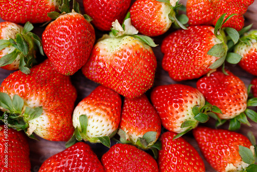 Fresh juicy strawberries with leaves. Strawberry..