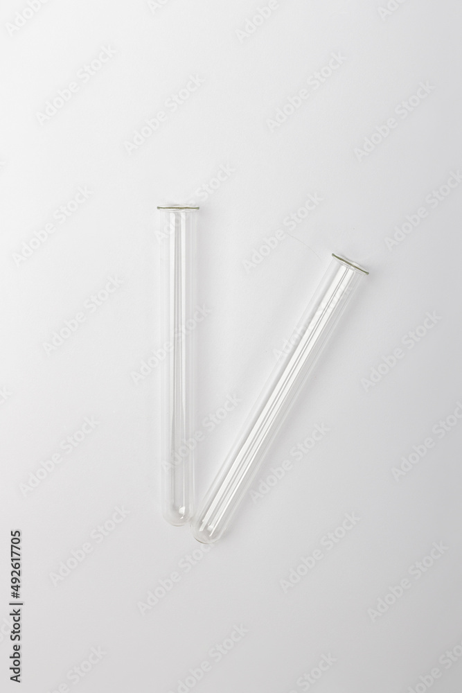 empty glass test tubes on white background empty glass test tubes on white background