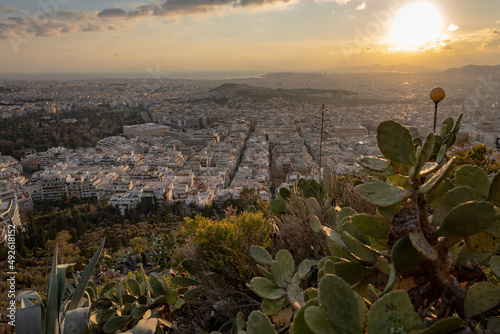 Athens Greek capital seen from above. Bird's eye view from Acropolis over the city with white houses, towers. photo