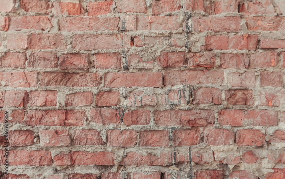 Abstract texture, horizontal brick tile background. Old and weathered red brick wall close up. Vintage house facade. Abstract texture, horizontal brick tile background. Old and weathered red brick wall close up. Vintage house facade.