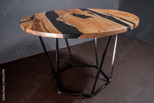 Modern wooden table made of epoxy