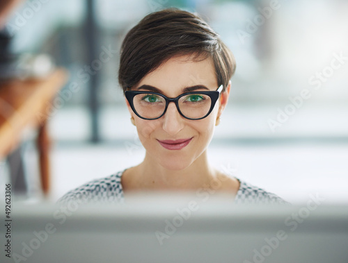 I always find so much inspiration online. Portrait of a young businesswoman working on a computer in an office.
