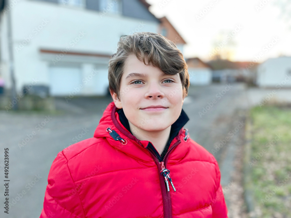 Portrait of little school kid boy. Beautiful happy child looking at the camera. Schoolboy smiling. Education concept. Portrait of little school kid boy. Beautiful happy child looking at the camera. Schoolboy smiling. Education concept.