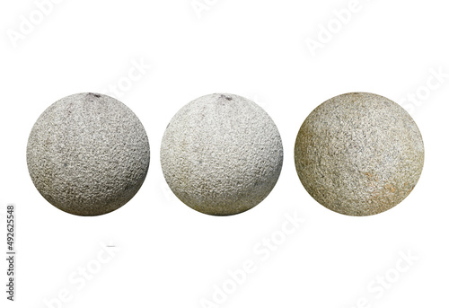 Cut out three big rounded granite stone rocks are isolated on white background. spherical stone rocks. Stone for outdoor garden decoration.