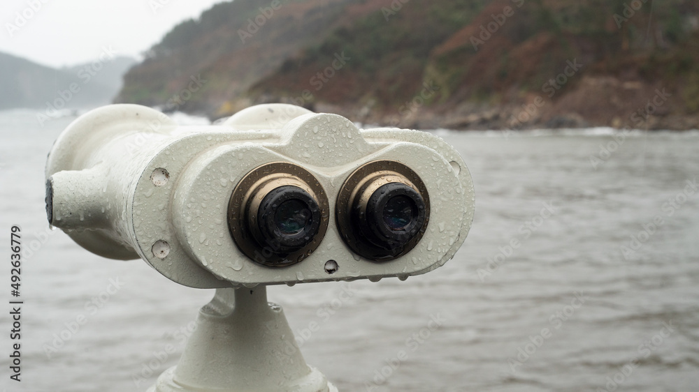 large binoculars to see the mountainous landscape large binoculars to see the mountainous landscape