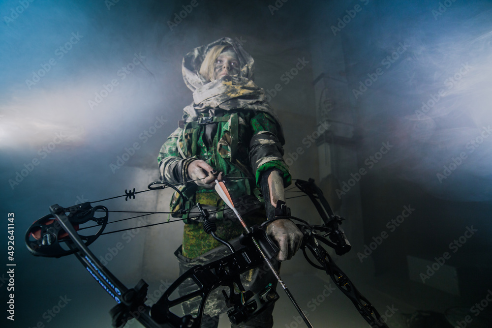 Fototapeta premium apocalypse fighters. a girl with a bow 