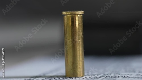 Close up, macro shot of bullet sell. Gun's equipmant cartridge brass photo