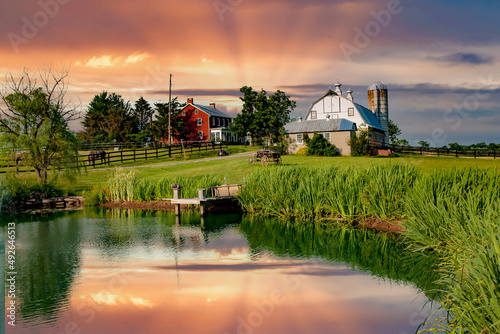 A pond and a barn with silo near Emmitsburg, Maryland. photo