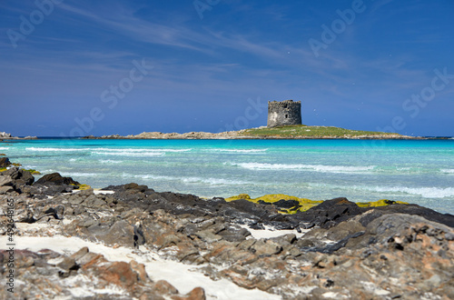 Beautiful panoramic view of Pelosa Beach (Spiaggia Della Pelosa). Stintino. La Pelosa beach, probably the most beautiful beach in Sardinia, Italy. Popular travel destination. Mediterranean seacoast.