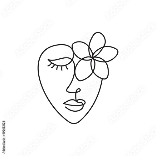 Face of an abstract woman with a flower.