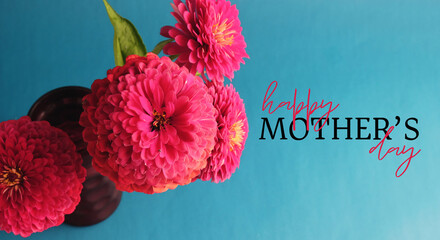Zinnia flower bouquet for Mothers day holiday greeting with blue background.