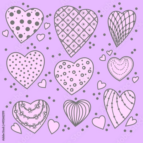 Pink hearts with patterns on a lilac background. Set of isolated hearts for Valentine's Day. Festive background. Collection of elements for holiday design and creative ideas.