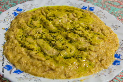 Meal in Iran - Halim bademjan - made of eggplant and lentils photo