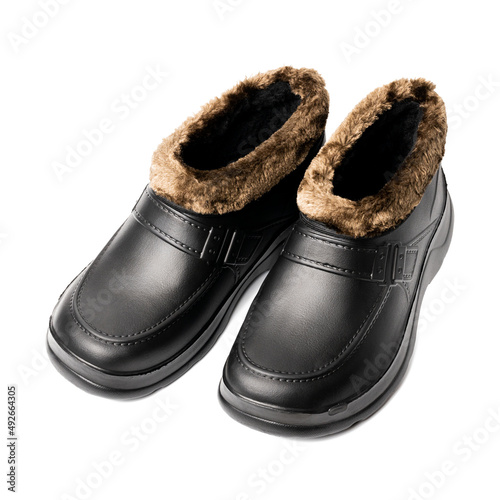 warm waterproof comfort shoes and boots isolated on white background. black rubber or plastic clogs cut out. gardening clogs