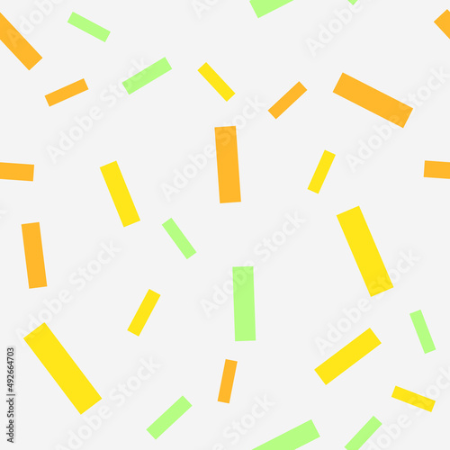 Seamless pattern with confetti. Abstract geometric pattern with green, orange and yellow confetti. Random, chaotic background with cute confetti.