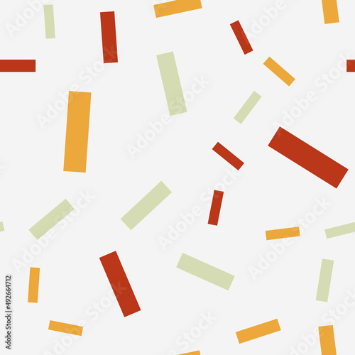 Seamless pattern with confetti. Abstract geometric pattern with red, orange and grey confetti. Random, chaotic background with cute confetti.
