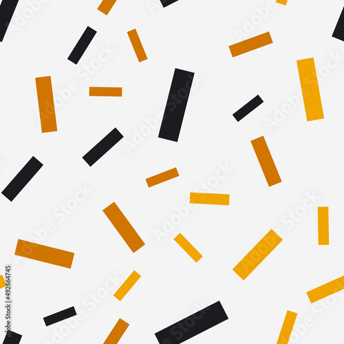 Seamless pattern with confetti. Abstract geometric pattern with gold, black and yellow confetti. Random, chaotic background with cute confetti.