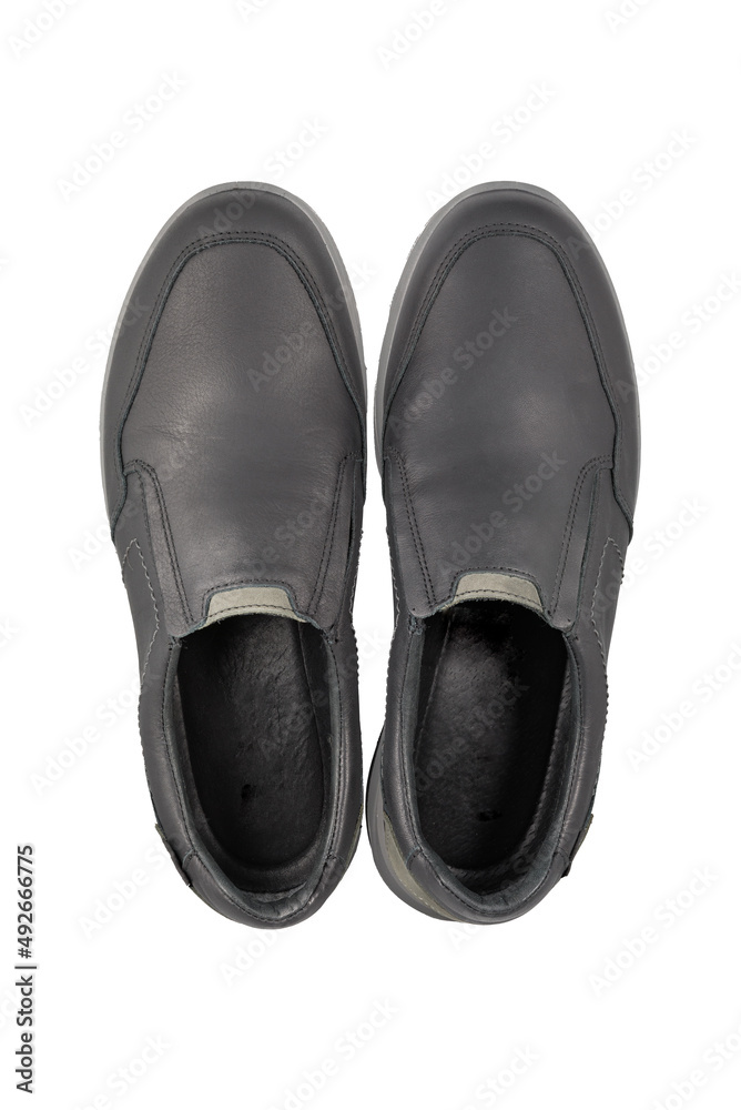 Black leather shoes isolated on white background. Full depth of field. Close-up. Black leather shoes isolated on white background. Full depth of field. Close-up.